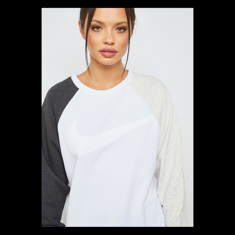 NWT Nike Women’s grey and charcoal sweater.